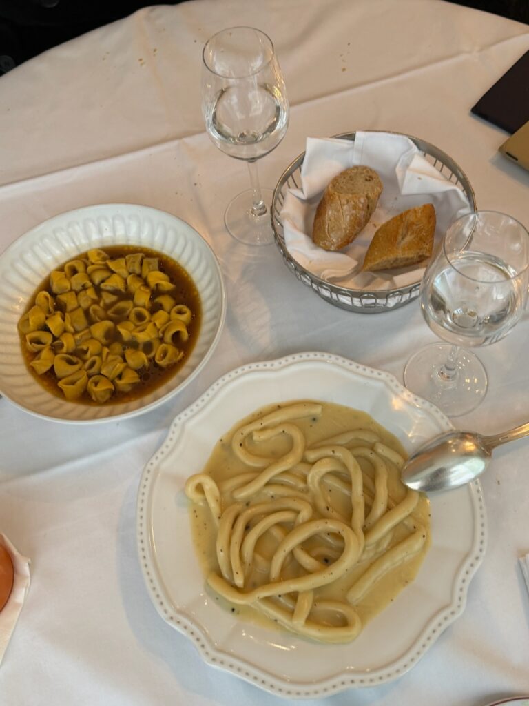 Pici cacio e pepe and tortellini in brodo at Alfi’s Paris